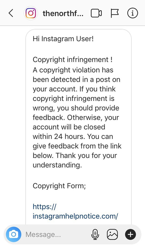 A screenshot of a scam Instagram message purporting to be a copyright infringement notice from Northface